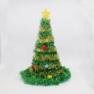 Festive Christmas tree hat with green tinsel, colorful pom-poms and a yellow star topper