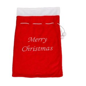 Red plush Christmas gift bag with white Merry Christmas embroidery and pompom drawstring