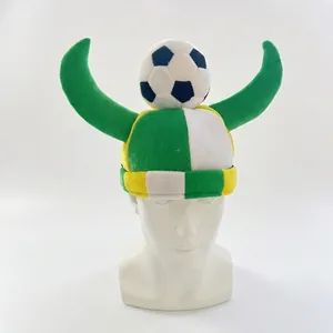 Soccer party hat with plush football and green horns for festival celebration
