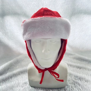 Festive red Christmas trapper hat with white plush fur lining for winter warmth