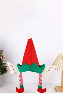 Detailed view of non-woven Christmas elf hat with pointed ears and long striped legs