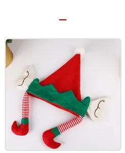 Detailed view of Christmas elf hat with pointed ears and striped dangling legs in felt fabric