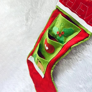 Large Christmas stocking with multi-pocket design, BELIEVE embroidery and reindeer motifs