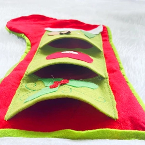 Large festive snowman Christmas stocking with multiple countdown pockets for holiday candy
