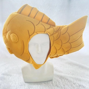 Detail of plush yellow fish headgear with realistic scales for photo props and costumes
