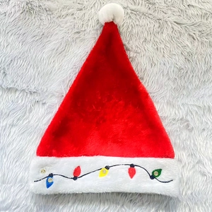 Plush Christmas hat with colorful LED embroidery and classic white pompom decoration