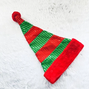 Festive red and green sequin Christmas hat with horizontal stripes and soft plush trim
