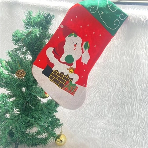 Classic Christmas stocking with Santa Claus embroidery and festive ornaments on white plush
