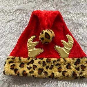 Christmas red plush reindeer hat with leopard print brim and shiny gold antlers