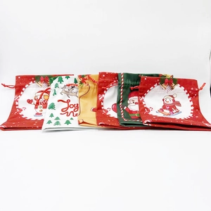 Christmas drawstring gift bags featuring festive Santa and snowman patterns in multiple colors
