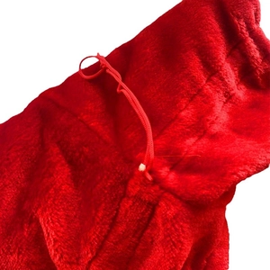 Red velvet Christmas gift bag with durable drawstring loop and premium sewing details