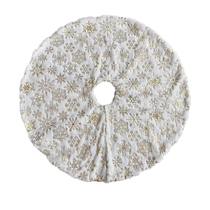 White plush Christmas tree skirt with golden snowflake foil patterns, 90cm diameter