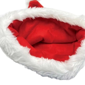 Plush red Christmas hat for adults with thick white faux fur trim on white background