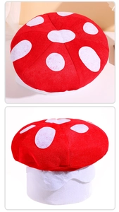 Detailed top and side views of a plush red mushroom hat with white polka dots