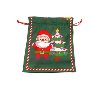 Christmas drawstring gift bag with cartoon Santa Claus and tree on green background