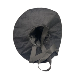 Classic black witch hat for Halloween with a wide brim and vintage fabric star pattern