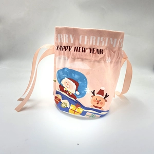 Pink velvet Christmas drawstring gift bag with Santa Claus and reindeer cartoon pattern