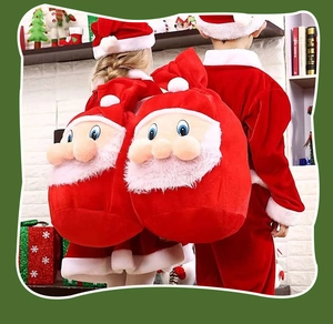 Detail of red plush Santa Claus drawstring backpack with 3D facial features for children