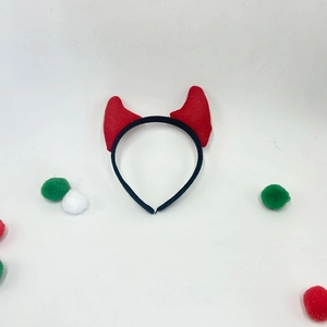 Halloween devil horn headband with red knitted texture and fuzzy pom poms for bar parties