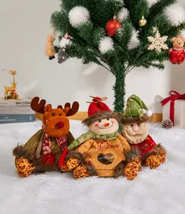 Christmas gift bags with reindeer and snowman characters and transparent windows