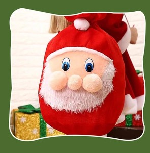 Detail of red velvet Santa Claus gift bag with white faux fur beard and embroidered face