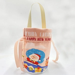 Pink velvet Christmas gift bag with Santa and Reindeer prints and satin drawstring closure