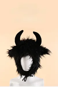 Macro detail of the black furry bull horn hat featuring tie straps and party styling