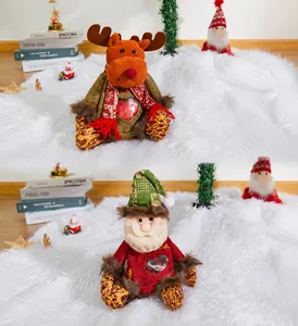 Christmas gift bags with Santa and reindeer motifs featuring a heart-shaped clear window
