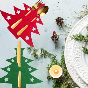 Felt Christmas tree cutlery holders in red and green colors with white star pattern