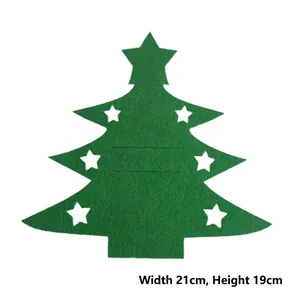 Detail view of green felt Christmas tree cutlery holder with white stars 21x19cm