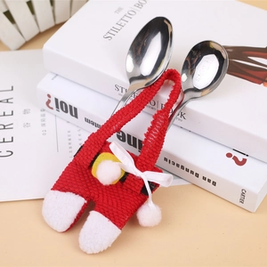 Christmas silverware set with red knit bib pants decorative holder and stainless spoons