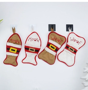Set of four plush fish and bone shaped Christmas stockings with Meow and Woof embroidery