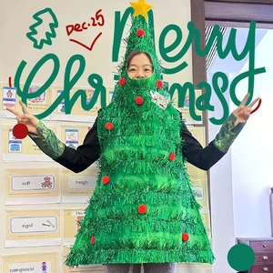 Kids Christmas tree costume with green pine needle texture and yellow star topper