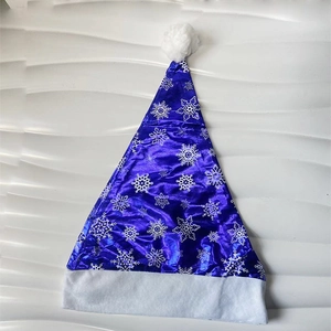 Blue Christmas hat with metallic fabric and white snowflake prints for holiday party decor