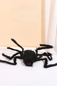 Detailed view of large black furry spider with red eyes for Halloween outdoor decor