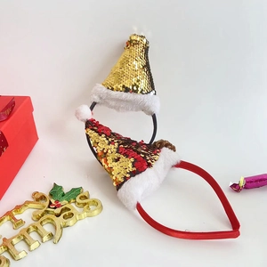 Detail of Christmas headbands featuring reversible sequins and plush white trim on festive hats