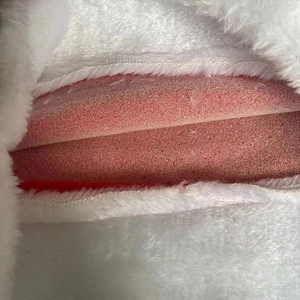 Classic red plush Christmas hat for adults featuring white faux fur trim and sponge lining