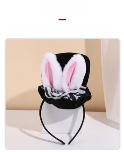 Detail of plush bunny ears and mini top hat on festive headband for Easter parties