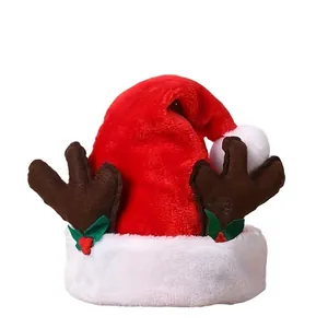 Christmas plush hat with reindeer antlers and green holly leaves on white background