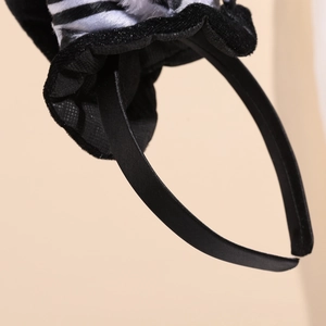 Plush bunny ear headband with zebra stripes and black satin nonslip lining for parties