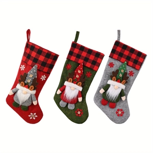 Set of 3 3D gnome Christmas stockings with buffalo plaid cuffs and snowflake patterns