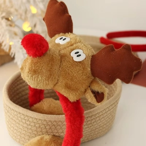 Cute Christmas reindeer headband with red nose and plush antlers for holiday party outfits