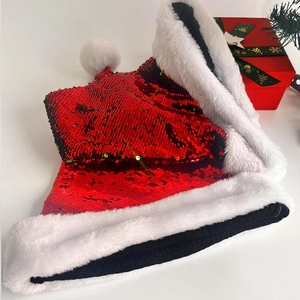 Festive red sequin Christmas hat with white faux fur trim and gift box decoration