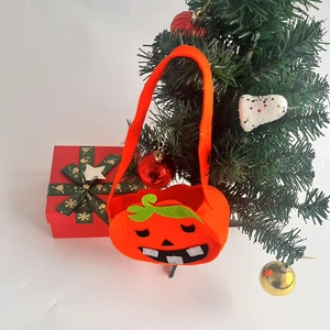 Cute 3D Halloween pumpkin candy bag made of orange non-woven fabric with green leaf handle