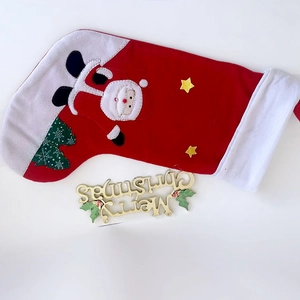 Festive red and white Christmas stocking with Santa Claus and tree embroidery decoration