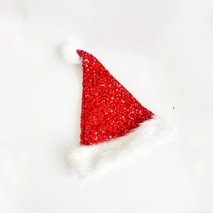 Classic bright red sequin Christmas hat for adults with plush white trim on white background