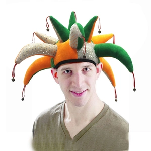 Detail of colorful clown hat with shiny sequins and small metal jingle bells on top
