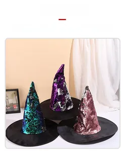 Detail of three sequined witch hats with reversible blue, purple, and rose gold sequins