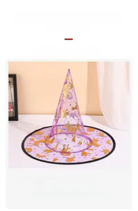 Detailed view of purple organza witch hat with golden pumpkin and bat prints