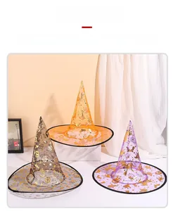 Detailed view of Halloween witch hats in orange, black, and purple with golden star patterns